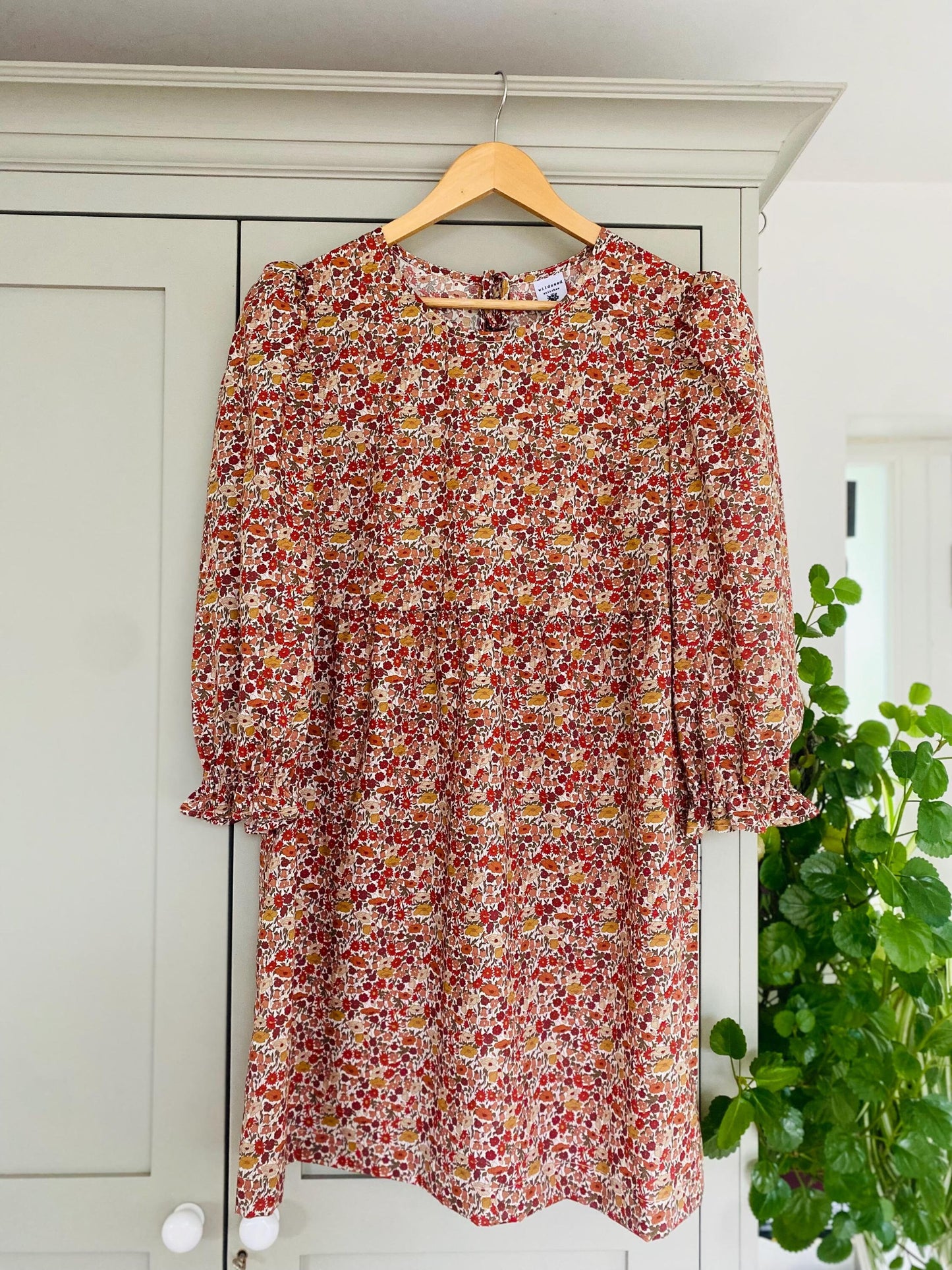 Hand made Liberty of London Tana Lawn Floral mini smock Dress in Liberty of London print with 3/4 puff sleeve with shirred elastic cuff. A line ditsy print dress