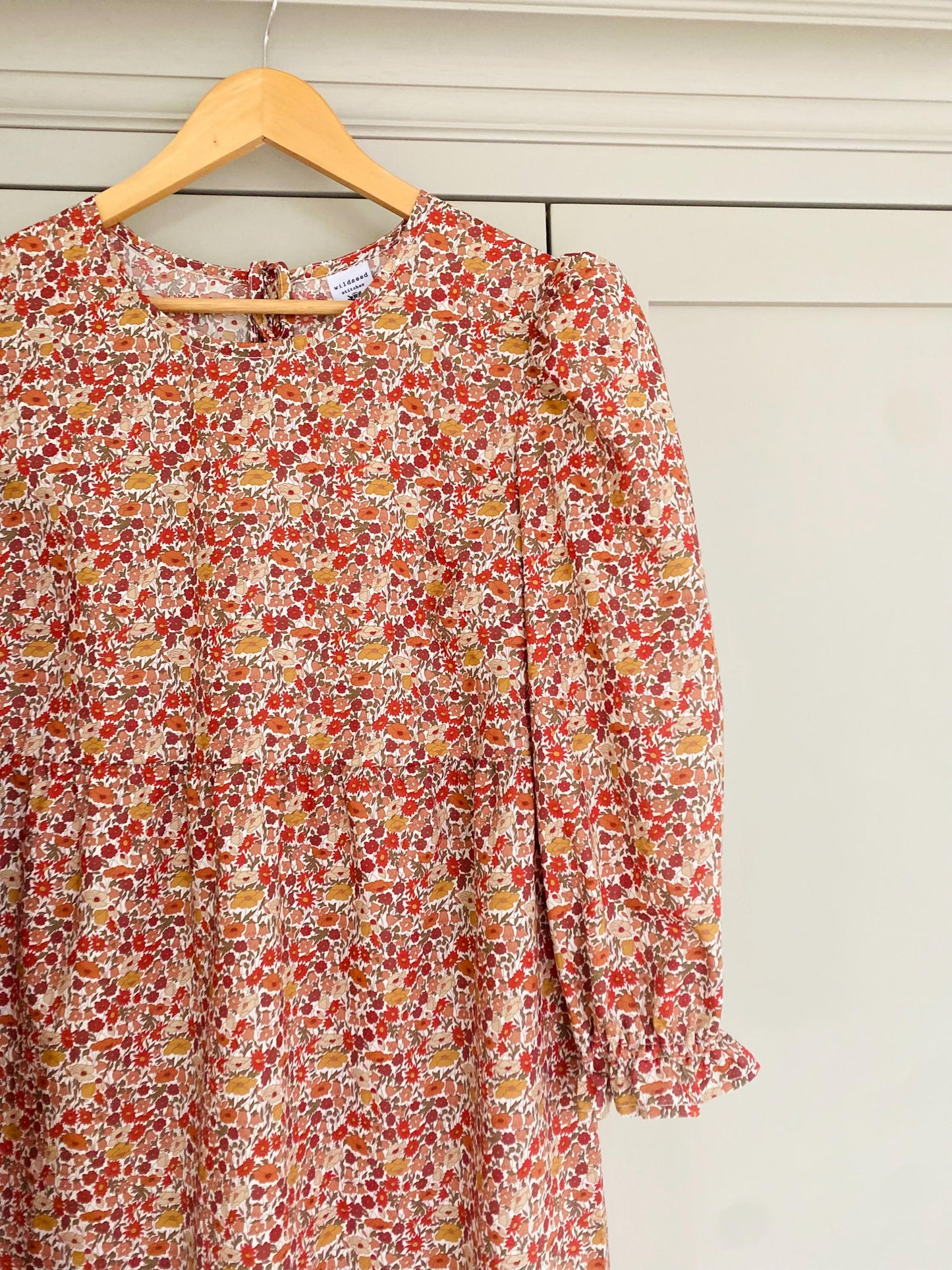 Hand made Liberty of London Tana Lawn Floral mini smock Dress in Liberty of London print with 3/4 puff sleeve with shirred elastic cuff. A line ditsy print dress
