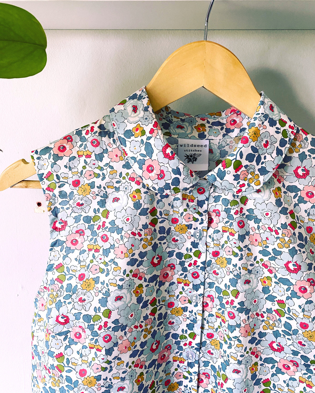 Dewberry Sleeveless Blouse