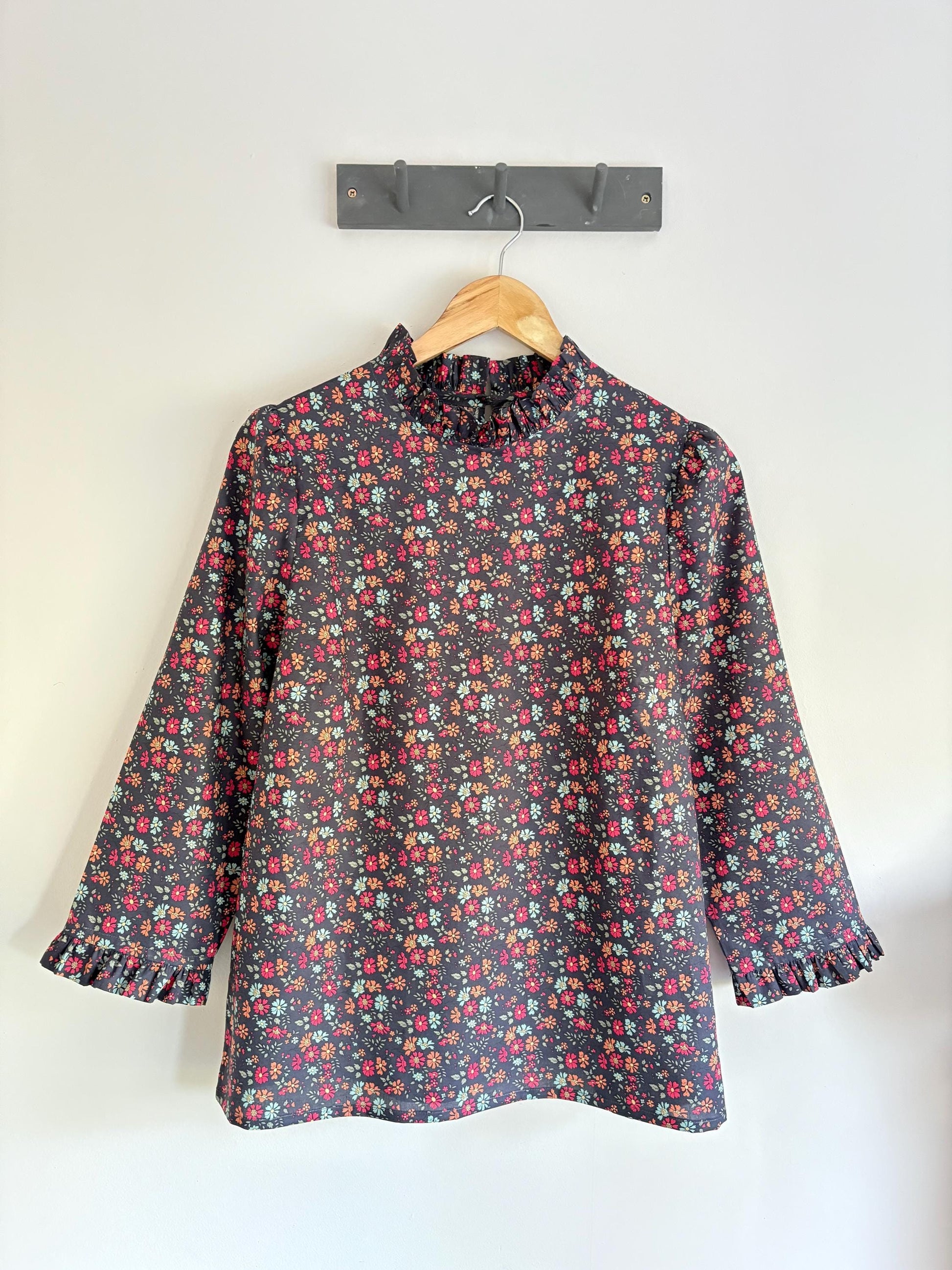 Blouse with ruffle collar, 3/4 sleeve and ruffle cuffs. Hand made to order in Liberty of London print cotton Tana Lawn.